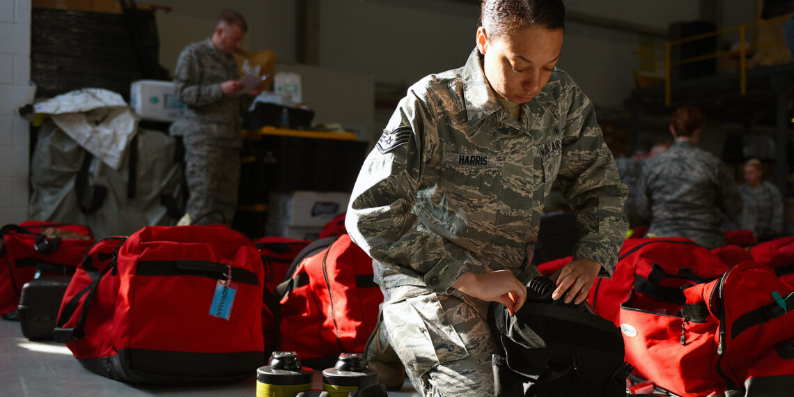 A biomedical equipment technician with the 121st Medical Group of the Ohio National Guard packs her gear for a training event.