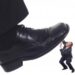 Shoe crushing a businessman