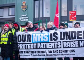Sharon Graham (centre) on a picket line today outside Cardiff ambulance station.