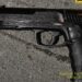Black replica gun made to look like a real semiautomatic handgun.