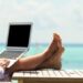 lawyer on laptop travel vacation beach