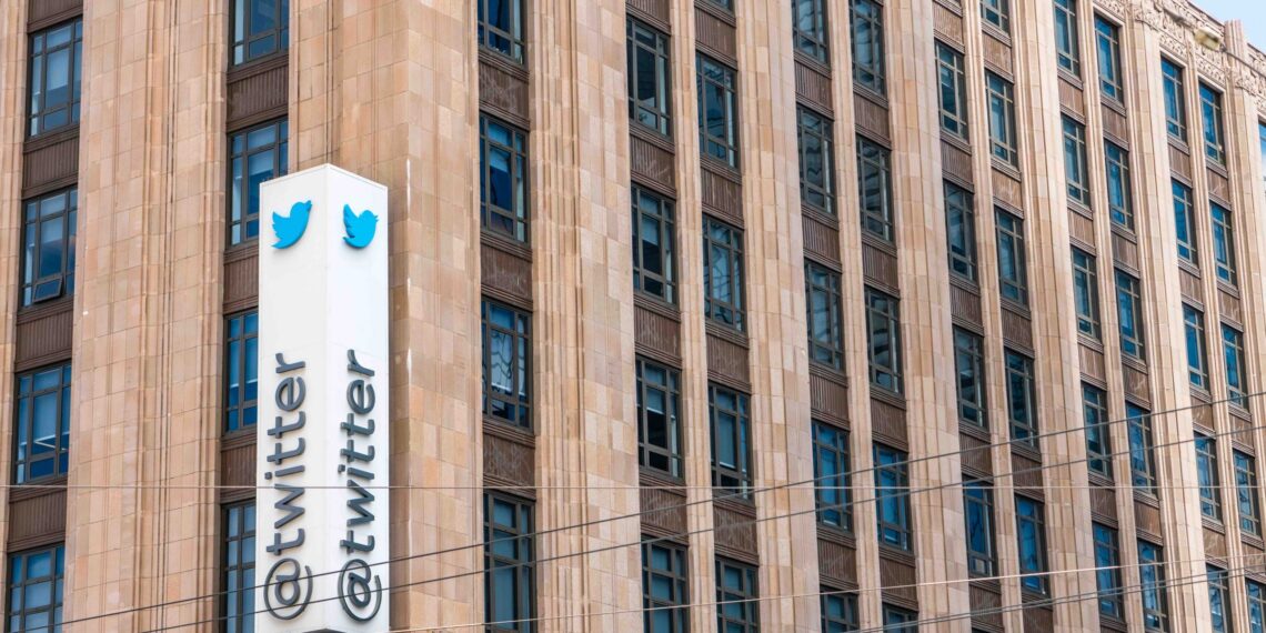 Office building with "@twitter" sign