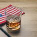 close up of a glass of bourbon whiskey