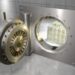 bank vault with stack of 100 dollar bills – Getty Images