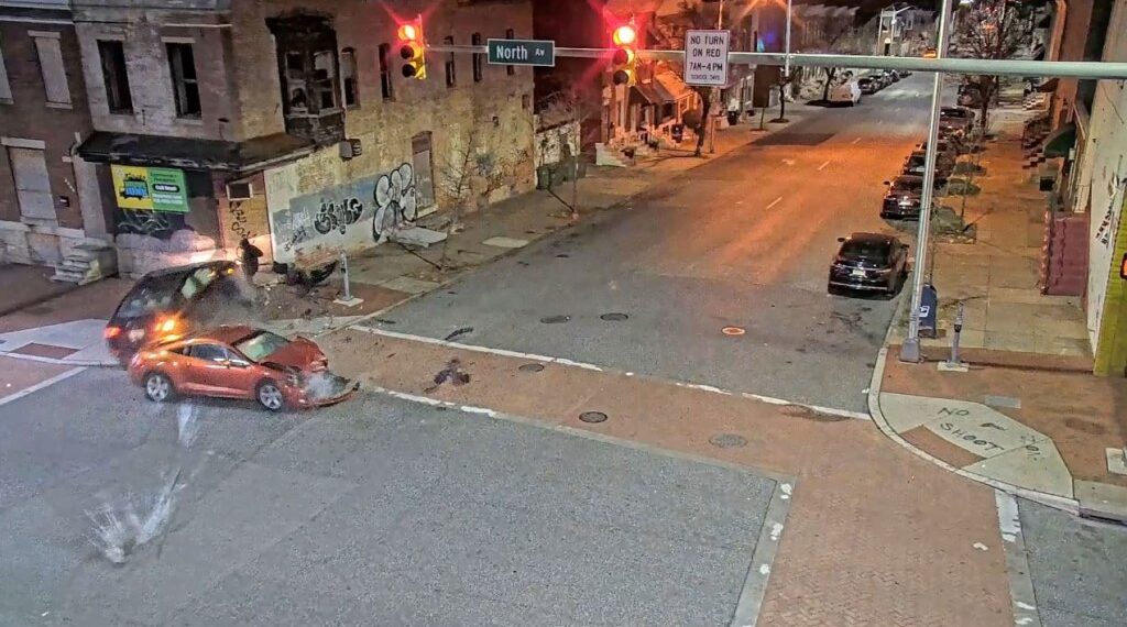 Two cars collide in Baltimore.