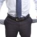 Broke and poor business man with empty pockets