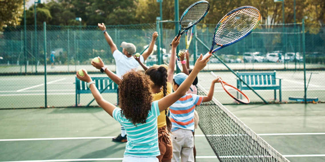 “Tennis brings us all together”: NYPD officers bond with youth through community tennis program