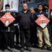 Protesters call for the release of Xu Zhiyong and other activists