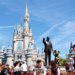 People mill around in Disney World in Orlando