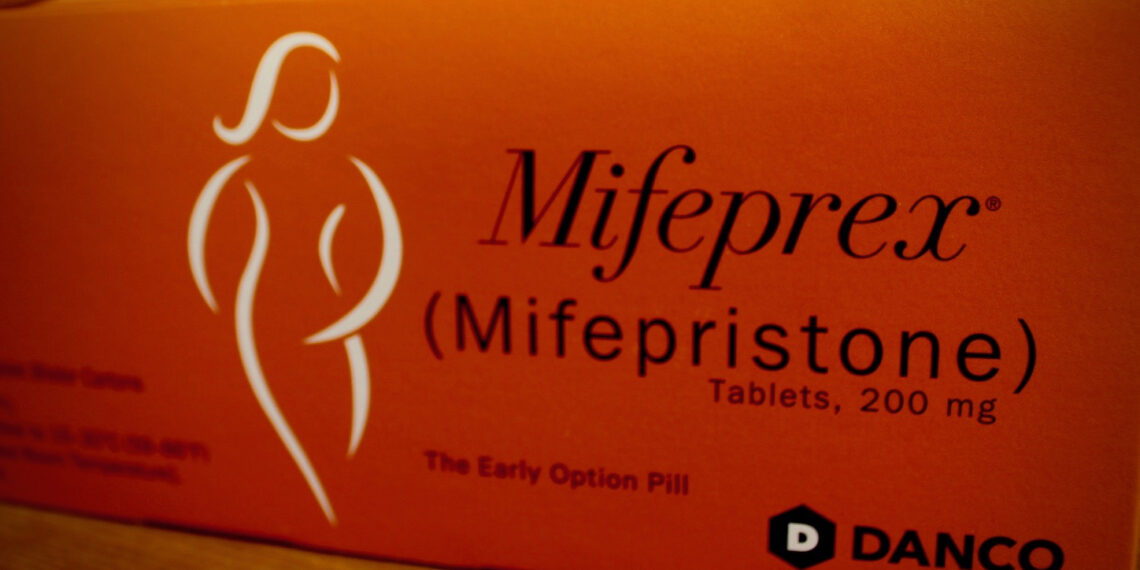 Orange box with "Mifeprex (mifepristone)" and a figure of a woman on it.