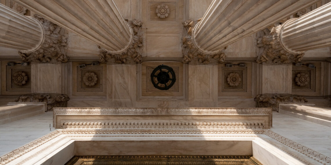 Looking up at the marble roof of the Supreme Court porch