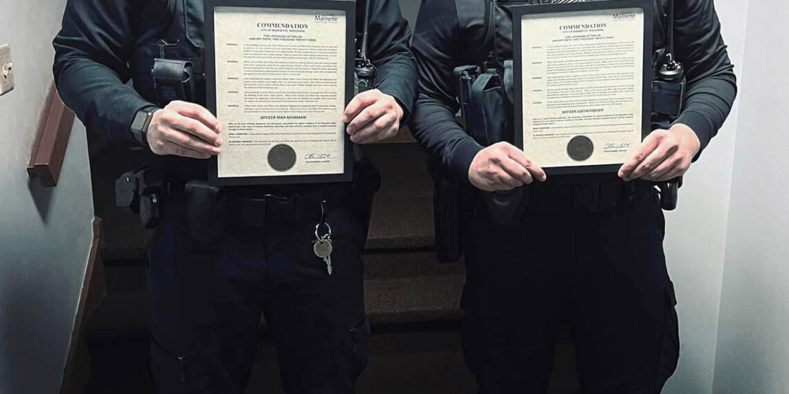 Two Marinette police officers honored by city after preventing suicide attempt