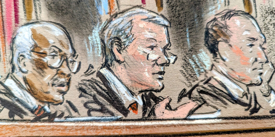 Man speaking into microphone on the bench