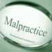 malpractice words with magnifying glass