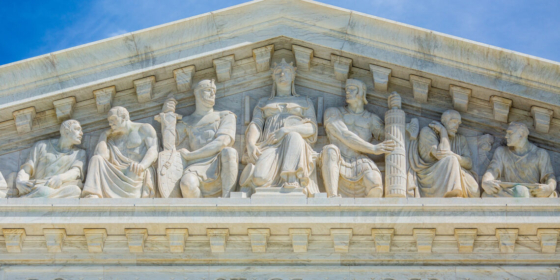 The busts on the front of the Supreme Court building