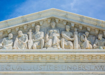 The busts on the front of the Supreme Court building
