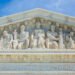The busts on the front of the Supreme Court building