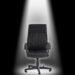 Office chair under spotlight