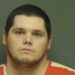 Austin Patrick Hall, 26, was arrested after an hours-long manhunt following the shooting of two Alabama sheriff's deputies, one of whom died, authorities said. 