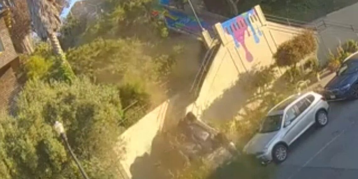 car crashed onto street