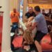 Part of the fight even included a women being dragged off a motorized scooter.