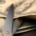 money and scissors