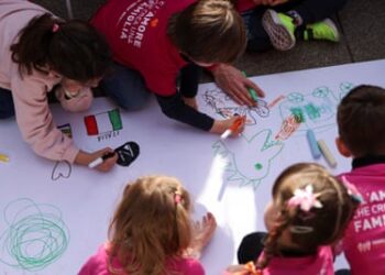 Children of LGBT couples draw during a protest in Milan.