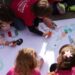 Children of LGBT couples draw during a protest in Milan.