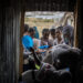 Tigrayans stand in line to receive food donated by local residents at a reception center for the internally displaced in Mekele, in the Tigray region of northern Ethiopia, on May 9, 2021. Credit: AP.