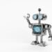 Humanoid mini robot with HUD hologram screen doing hand raised up on white background. Technology and innovative concept. 3D illustration rendering