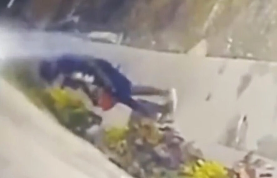 The man pouring the gasoline outside the church.