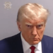 Former President Donald Trump posts his own mugshot on social media with message, ‘Never Surrender’ – Law Officer