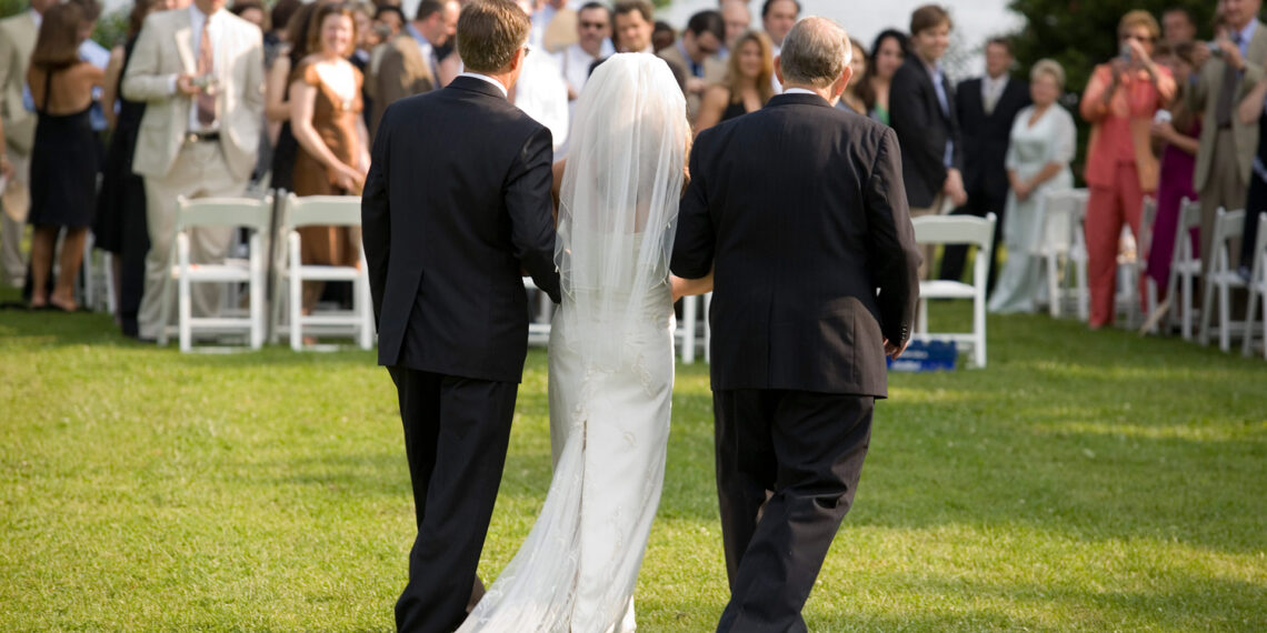 Bride escorted down the aisle by cop who put her abusive father in prison