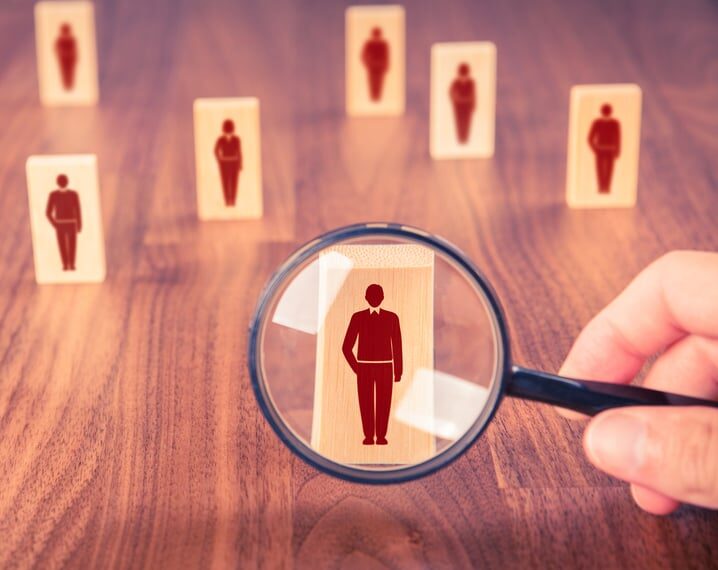 discrimination concept with magnifying glass