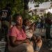Salma, a 28-year-old Nigerian woman, with her son