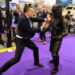 A man wearing a Chiron-X1 high-impact close-quarter fighting training suit is attacked by a member of the sales team during a demonstration at DSEI