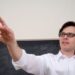 Lecturer pointing socratic method law school class