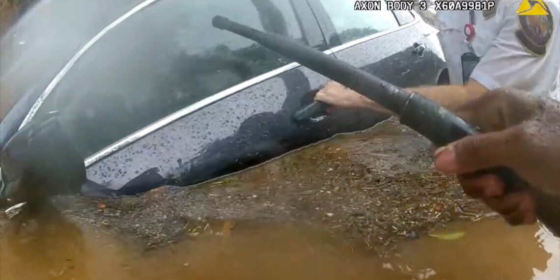 Atlanta police officer and fire rescue captain save trapped driver during flash flooding