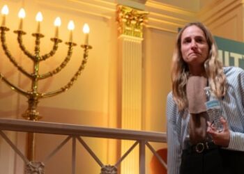 A survivor of Hamas’s attack on the Supernova music festival, Noa Ben Artzi, walks from the stage, during a gathering of the American Jewish Community in Washington’s Sixth & I Historic Synagogue on 17 October 2023.