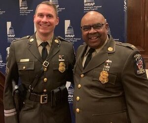 Sgt. Patrick Kepp (left) and Chief Marcus Jones (right) at an awards ceremony in 2021.