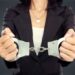 Handcuffed female lawyer