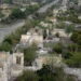 This image depicts a destroyed city in Nagorno-Karabakh from the first Armenia and Azerbaijani conflict.