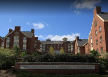 One female victim was showering on the third floor of Hamilton Hall when she noticed a person standing next to the stall she was in, according to a criminal affidavit from Penn State University police.
