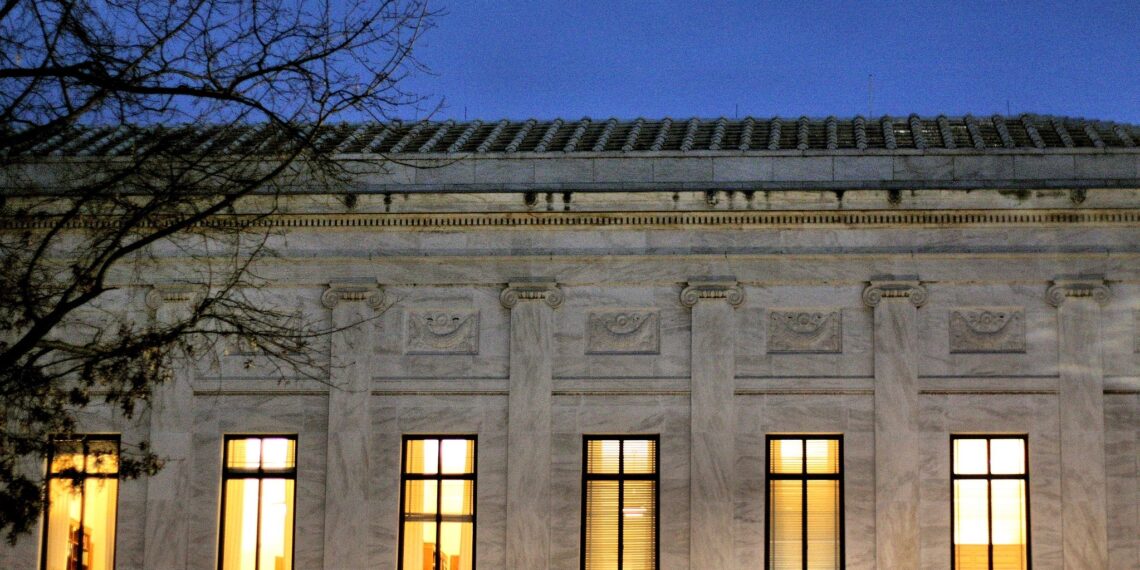 Windows in the supreme court building at night