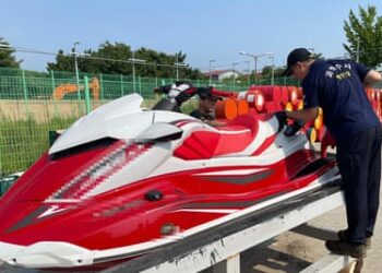 Coastguard staff inspect the jetski in Incheon, South Korea