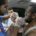 A wounded infant receives treatment at Al-Shifa Hospital.