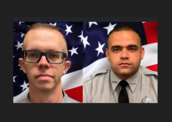 2 deputies wounded in ambush shooting by accused murderer out on bond