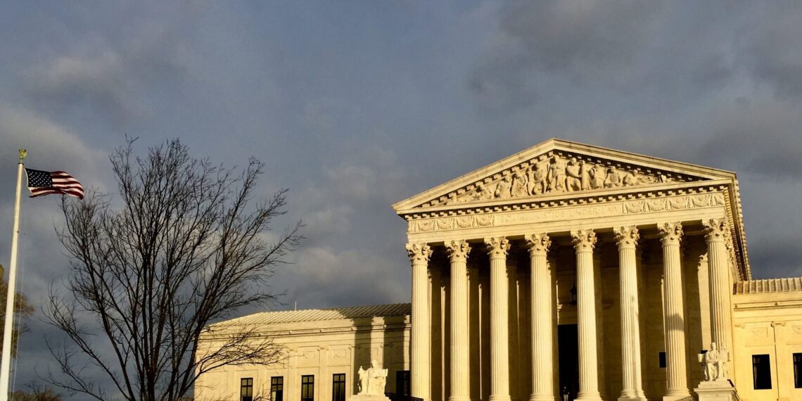 front facade of Supreme Court illuminated in winter sun