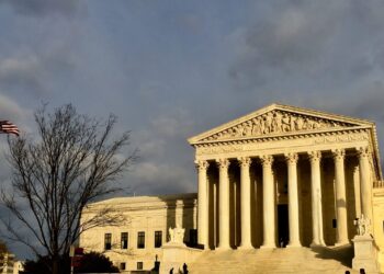 front facade of Supreme Court illuminated in winter sun