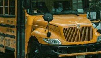 school bus parked on a city street
